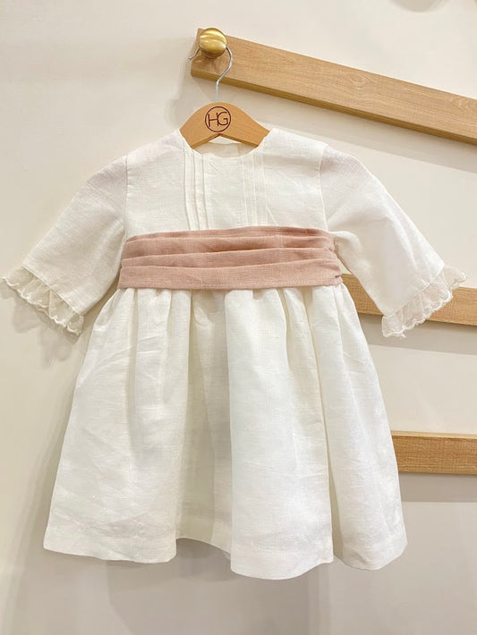 White linen dress with dry pink stripe, lace on the sleeve, pleats in the center