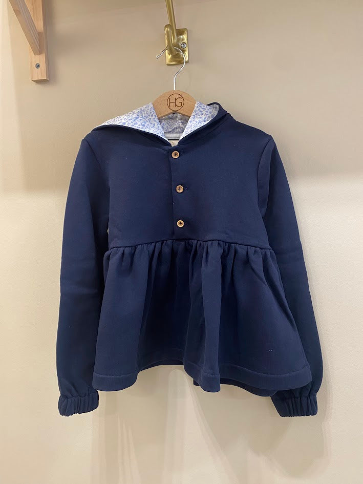 Pull bleu marine HG à capuche fleurie