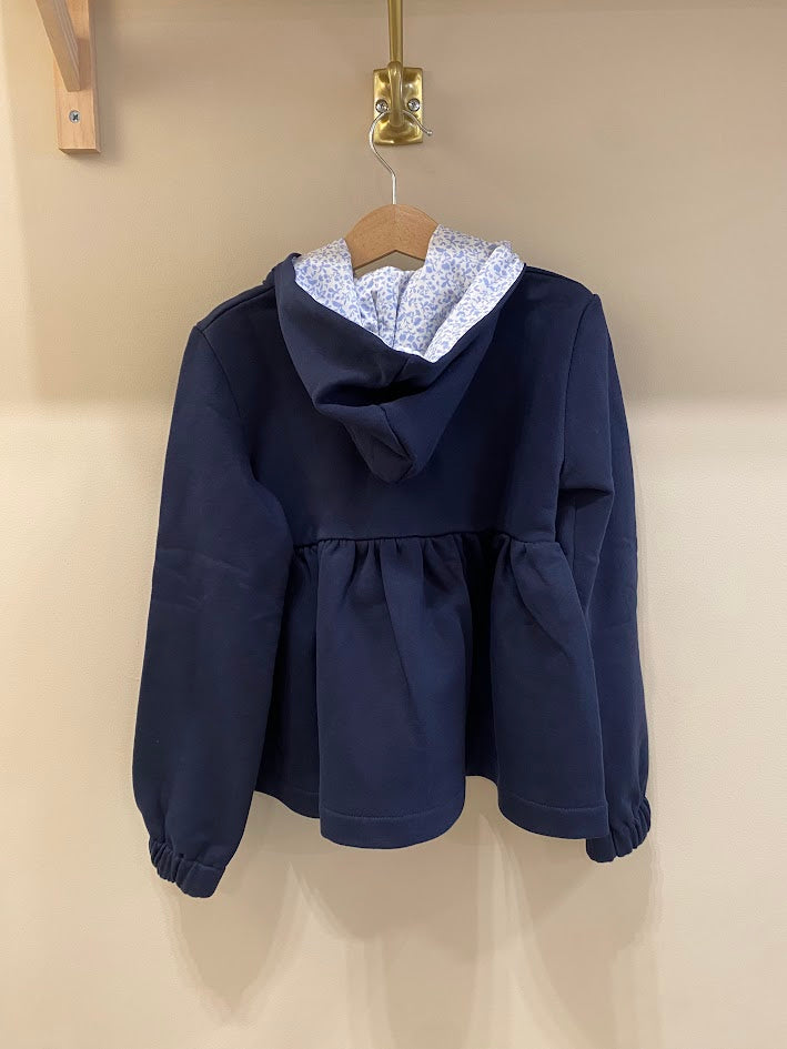 Pull bleu marine HG à capuche fleurie