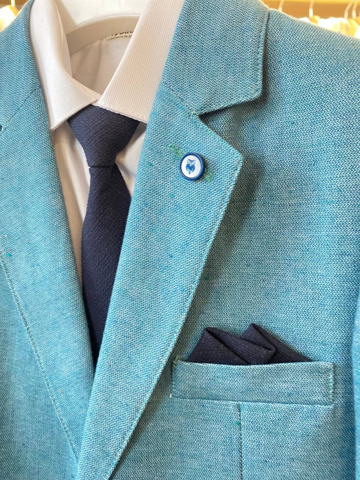 Costume bleu-vert avec cravate
