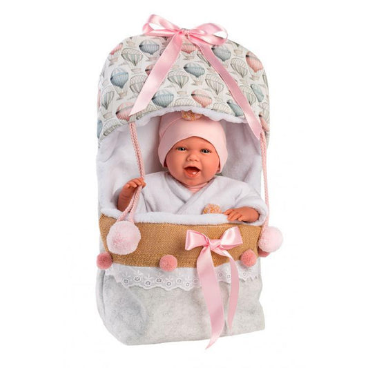 Mimi souriante avec un sac à ballons de 42 cm