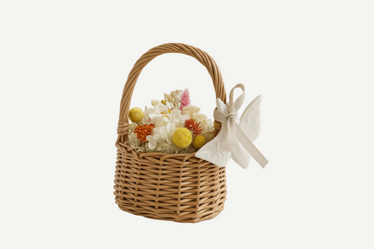 Basket of preserved flowers with white swallow