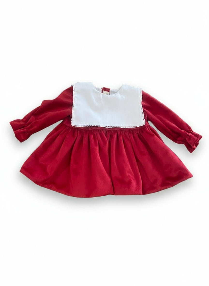 Red velvet dress with white collar.