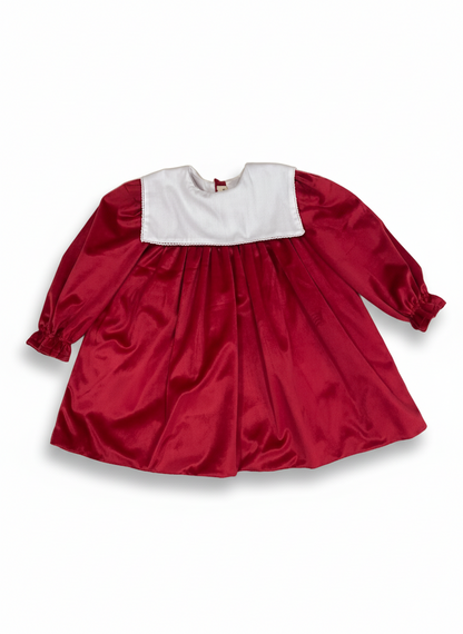 Red velvet dress with white collar.