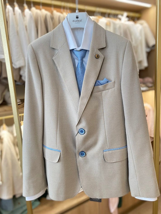 Beige suit with blue tie