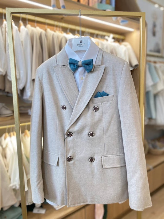 Beige suit with green bow