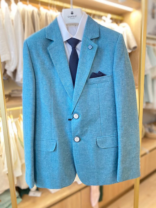 Blue-green suit with tie